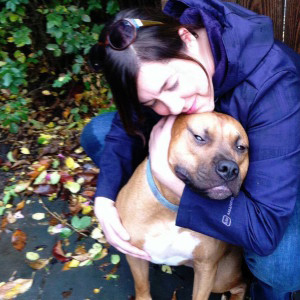 Dog trainer Lisa Skavienski poses for a photo with her much-loved dog Tuck