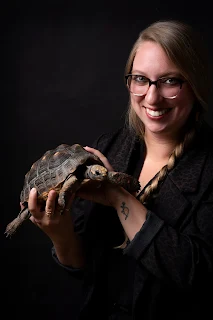 A portrait of the writer E.B. Bartels with her tortoise