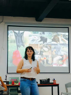 Ruby Leslie of Welfare For Animals gives a talk on dog training at a conference