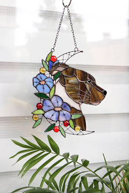 A boxer dog and flowers stained glass suncatcher