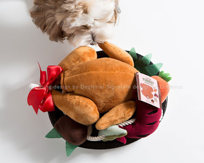 A dog toy that is a stuffed turkey snuffle mat and rope toy