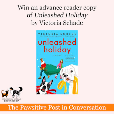 Enter to win a copy of Unleashed Holiday by Victoria Schade (US only). The cover shows a tree, a Boxer, and a Boston Terrier