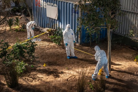 Students investigate a model crime scene at the Wildlife Forensic Academy