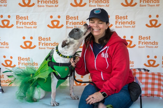 Allison Polumbus gets dog kisses from her dog “Gidget” at...