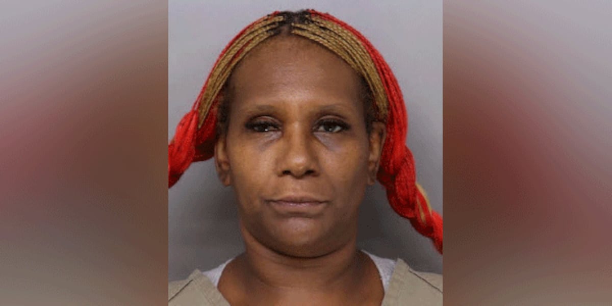 Woman hit dog with baseball bat, court docs say